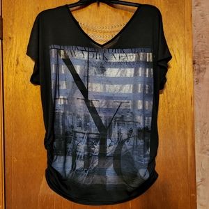 Cute black top with gold chain accent